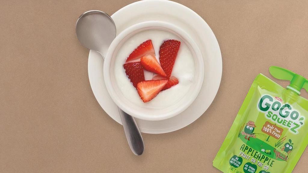 Kids Yogurt With Strawberries Or Blueberries · Yogurt topped with fresh strawberries or blueberries.