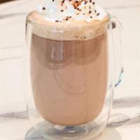 Café Mocha · Espresso, chocolate sauce, steamed milk topped with froth. Finished with whipped cream and a...