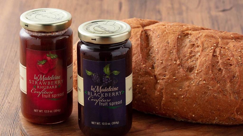 Bread & Jam Bundle · A loaf of freshly baked bread paired with your choice of housemade confiture - Blackberry or Strawberry Rhubarb.