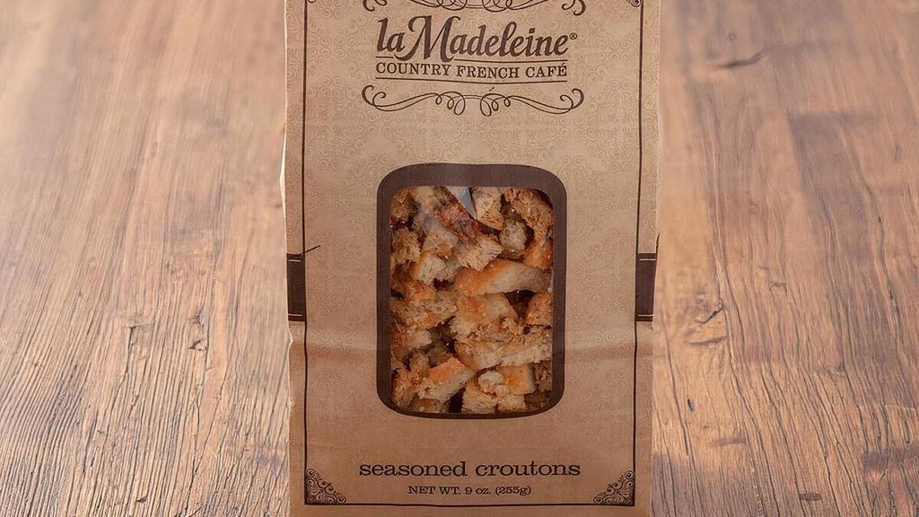 Croutons · Our sourdough and wheat bread baked until crisp and seasoned with garlic.