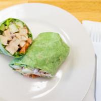 California Wrap · Chicken, romaine lettuce, red beans, cilantro, guacamole, red onion, cheddar cheese and chip...