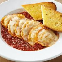 Baked Cheese Ravioli · Cheese stuffed ravioli baked in our marinara sauce & topped with mozzarella cheese.