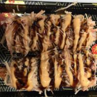 Tornado Roll (8 Pcs) · Tempura shrimp and cream cheese inside, crab meat, spicy mayo and eel sauce on top