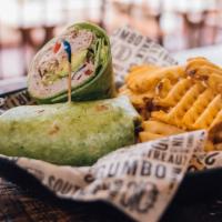 Cali Wrap · Spinach tortilla, sliced turkey, bacon, Swiss, lettuce, avocado, tomato, garlic aiolo, with ...