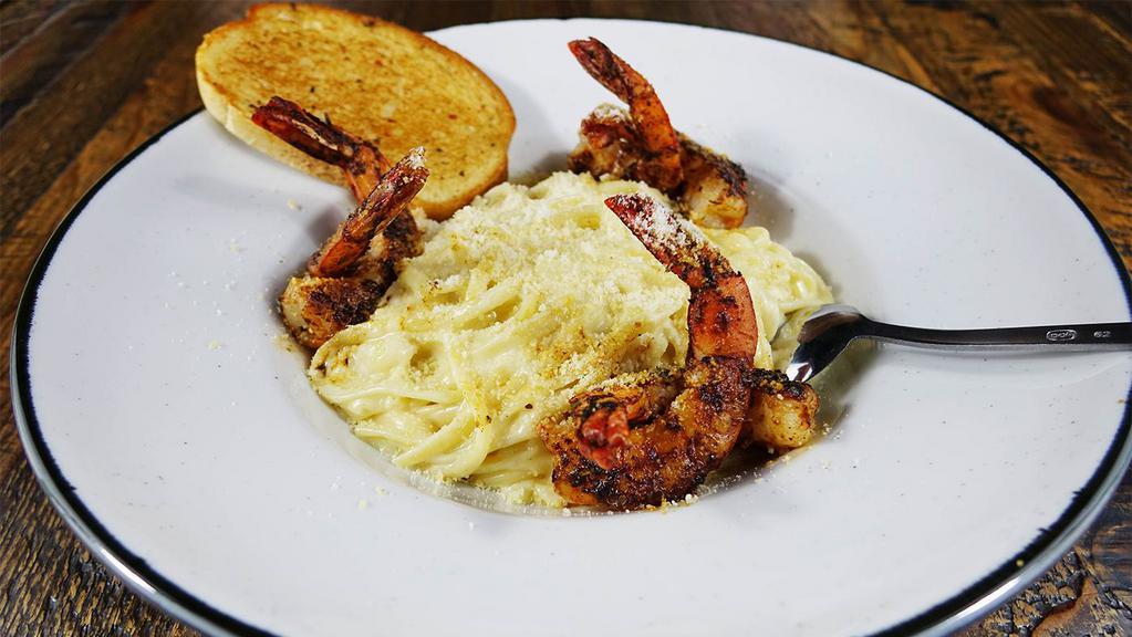 Shrimp Alfredeaux · Blackened Jumbo Gulf Shrimp, linguine, alfredeaux sauce, parmesan, garlic bread