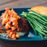 Tuscan Chicken · Two five ounce blackened chicken breasts, tomato basil salsa, rice, green beans, garlic bread.