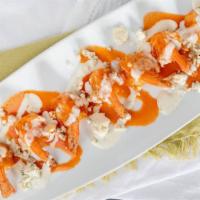 Buffalo Shrimp · Lightly seasoned, flash fried topped with crumbled blue cheese and  a side of blue cheese ai...