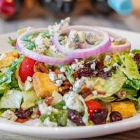 Stonewood Salad · Fresh mixed greens, bacon, bleu cheese crumbles, grape tomatoes, dried cranberries, red onio...