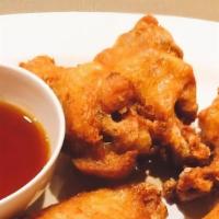 A6 - Fried Chicken Wings With Sweet Fish Sauce · Fried chicken wings with house special sauce