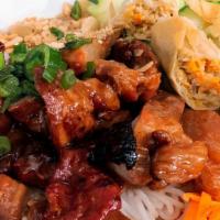 Grilled Pork & Egg Roll With Rice Vermicelli · Vermicelli noodle served with bean sprouts, lettuce, cucumbers, cilantro, peanuts, papaya, a...