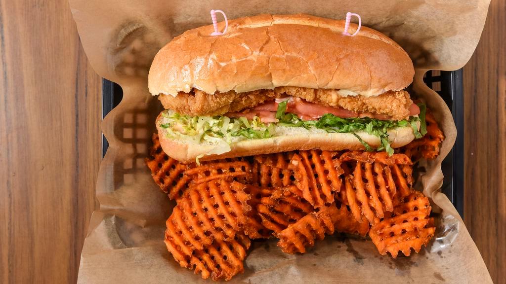 Fried Fish Po' Boy · Choice of catfish, flounder, or whiting fish. lightly battered and mildly seasoned. lettuce, tomatoes, and heroes bread and finished with remoulade sauce. served with your choice of fries.