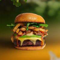 Fries Fries Baby Vegan Burger · Seasoned Beyond Meat patty topped with fries, avocado, melted vegan cheese, onion, lettuce, ...