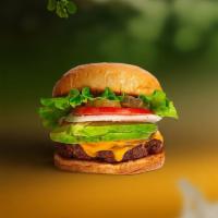 Avolution Vegan Burger · Seasoned Beyond Meat patty topped with avocado, melted vegan cheese, lettuce, tomato, onion,...