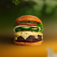 Papa Peno Vegan Burger · Seasoned Beyond Meat patty topped with melted vegan cheese, jalapenos, lettuce, tomato, onio...