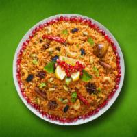 Vegetable Biryani Feast   · Vegetables cooked in a special curry then layered on the basmati rice with a hint of saffron...
