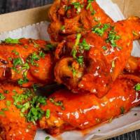 Hey Wings 10Pc · Un-breaded Deep-fried Jumbo Chicken Wings. Choice of Buffalo, BBQ, or Plain