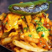 Chilli Cheese Fries Hey · Hand-cut Fries, Chili con Carne with Beans, Cheddar Cheese Sauce, Grilled Jalapeño
