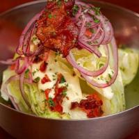 Iceberg Wedge Salad Hey · Iceberg Lettuce, Crispy Bacon, Tomatoes, Red Onion, Blue Cheese Dressing