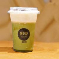 Uji Matcha Oolong Tea · Fresh brewed oolong tea mixed with high end japanese matcha powder topped with a layer of mi...