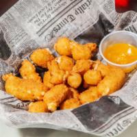 Wisconsin Cheese Curds · Served with Tin Cup Sauce