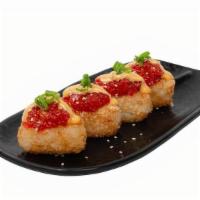 Spicy Tuna Krispy Rice · Bites of krispy rice topped with spicy tuna, spicy mayo, scallions and sesame seeds