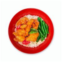 Pao Pao™ Rice Bowl · wok-fried and tossed in our signature spicy cream. glaze, green + red bell pepper, side of s...