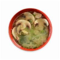 Miso Soup · A traditional Japanese soup consisting of Shiro miso, dashi broth, soft tofu, wakame, mushro...