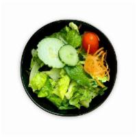 House Ginger Salad · Our house salad is served with a blend of Romaine, artisan greens, carrots, grape tomatoes, ...