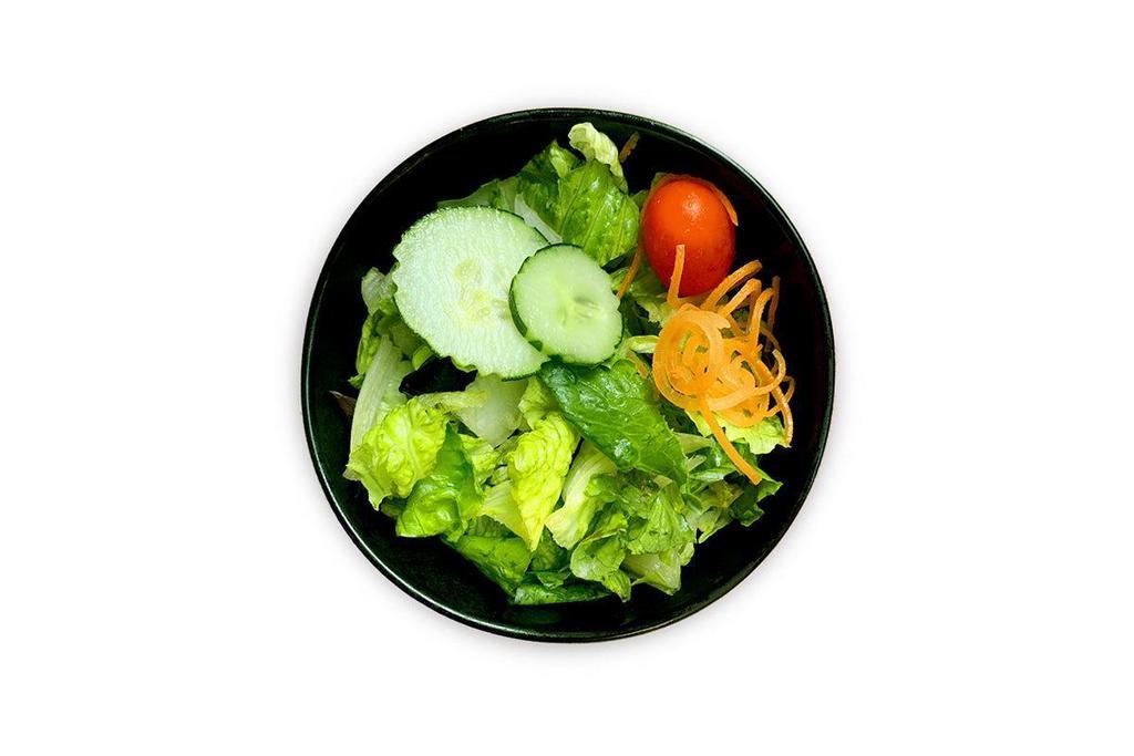 House Ginger Salad · Our house salad is served with a blend of Romaine, artisan greens, carrots, grape tomatoes, and cucumber.  Served with Ginger dressing.