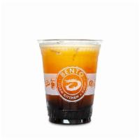 16Oz Thai Tea · Freshly brewed black tea with spices topped with cream served with honey boba!. *some locati...