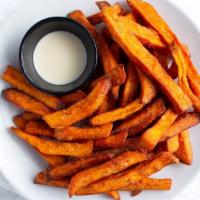 Sweet Potato · Perfectly crispy string style sweet potato fires served with maple cream sauce.