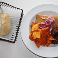 Chincha · chicharron, tamal, camote, sarsa criolla y un pan