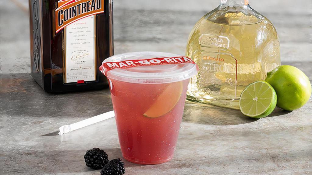 Patrón® Blackberry Margarita · Patrón® Reposado Tequila and Cointreau® shaken with blackberry. An ultra premium Mar-Go-Rita®.