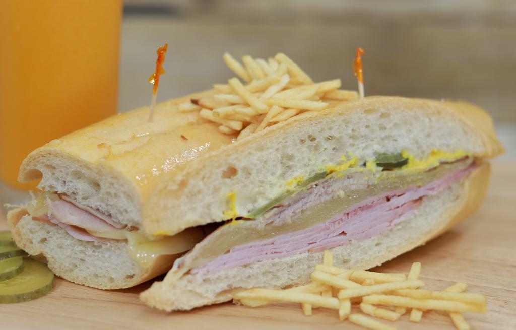 Sandwich Cubano Regular · Jamón regular, jamón pierna, queso suizo , pepinillo , mostaza, mayonesa y papitas fritas (Potato Stix)