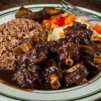 Oxtail · Slow cooked to 'yaad style' perfection.