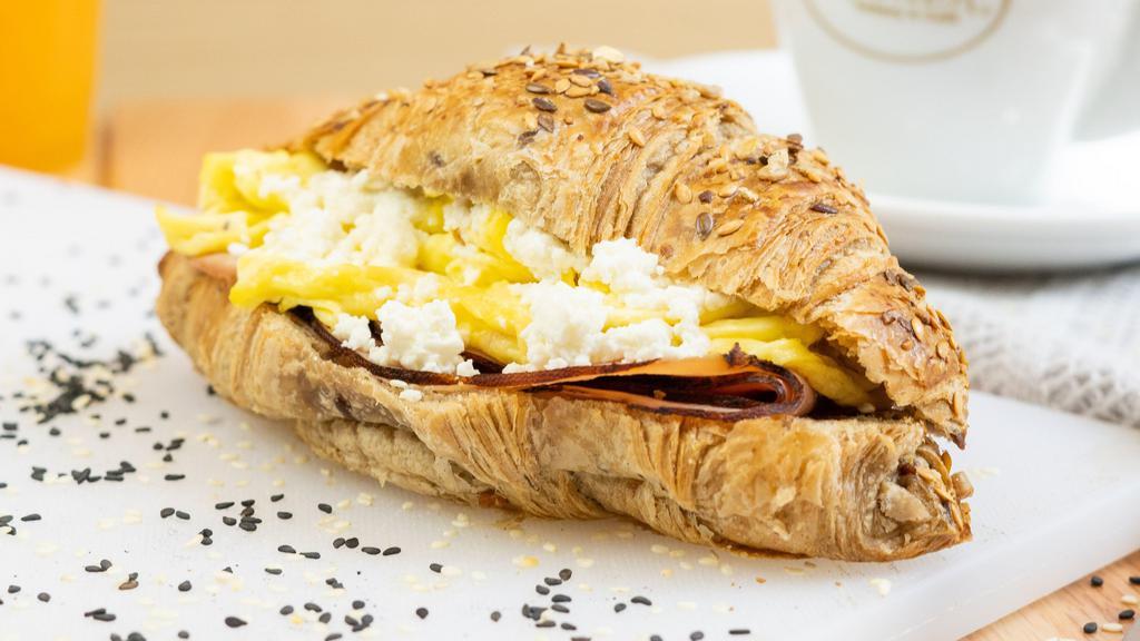Soft Cooked Egg Croissant · Ham. goat cheese, soft cooked egg and mixed greens