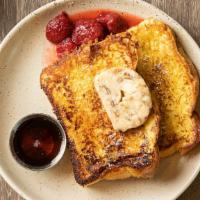 French Toast · Strawberry compote, pecan butter, and maple syrup.