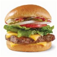 Dave'S Single® · A quarter-pound* of fresh beef, American cheese, crisp lettuce, tomato, pickle, ketchup, may...