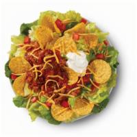 Taco Salad · Made fresh daily with Wendy’s signature lettuce blend, shredded cheddar cheese, diced tomato...