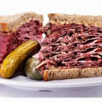 Manhattan Combo · A full pound of warm World Famous Carnegie Deli - half Corned Beef and half Pastrami with Ca...