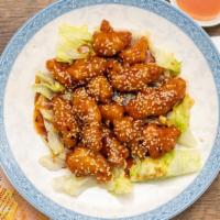 Sesame Chicken · Served with egg roll, fried rice or steamed rice and choice of soup: egg drop soup wonton so...