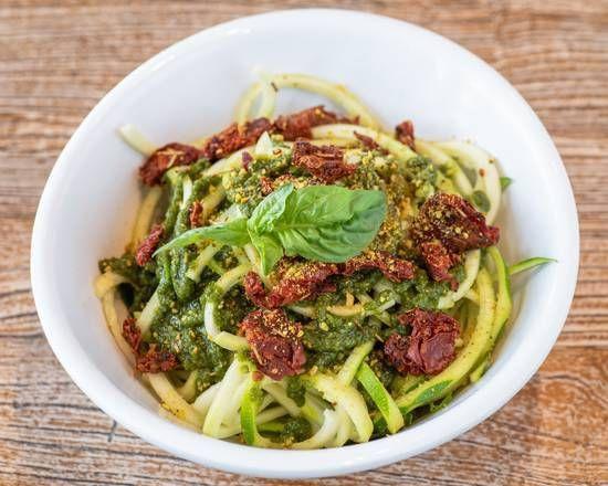Raw Pesto Bowl (V, Gf) · Made to order raw zucchini pasta, topped with fresh vegan pesto, house-made vegan parmesan and herb roasted sun dried tomatoes.  Served Cold