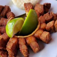 Chicharron Con   (Arepa Or Yuca Frita ) · Pork skin with corn patty.fried patty.fried cassava