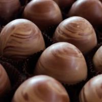 Peanut Butter Truffle · Intense peanut butter truffle with a touch of sea salt covered in milk chocolate.