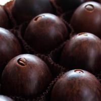 Mocha Truffle · Dark chocolate truffle blended with coffee covered in milk chocolate and topped with a coffe...
