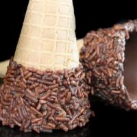 Milk Chocolate Dipped Cone · Jr. waffle cone dipped in milk chocolate with chocolate sprinkles.
