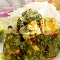 Palak Paneer · Chefs specialty. Fresh spinach cooked with homemade cheese cubes, tomatoes, onions, and spic...