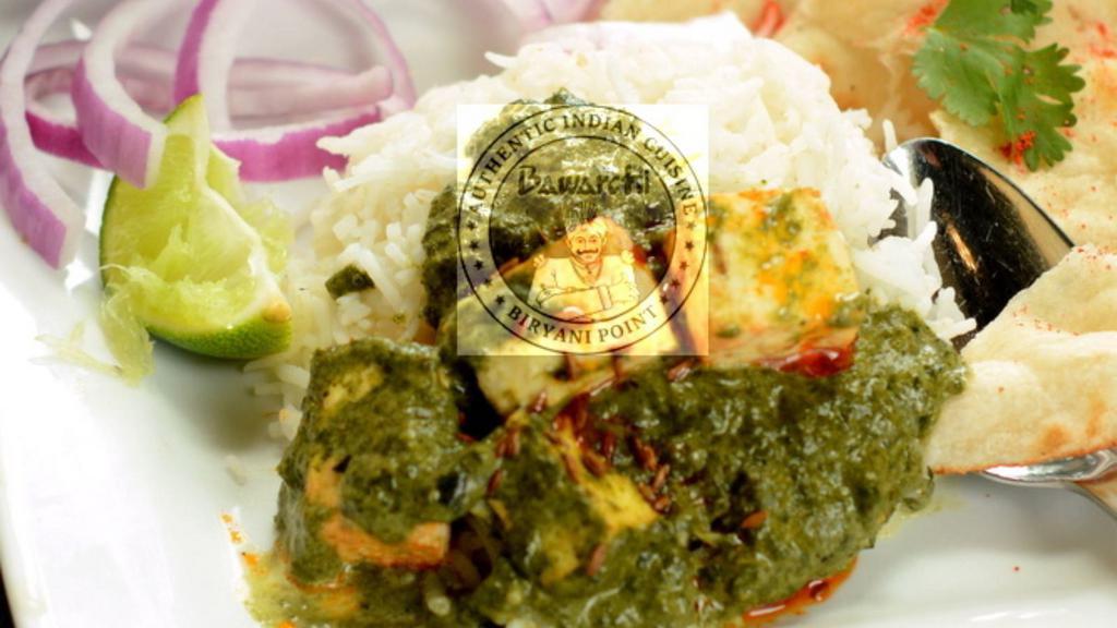 Palak Paneer · Fresh spinach cooked with homemade cheese cubes & spices.