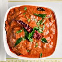 Chicken Chettinad · Boneless chicken pieces cooked in Southern style.