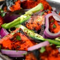 Paneer Tikka Kabab (6 Pieces) · Paneer marinated in yogurt with special herbs and spices and grilled in clay oven.